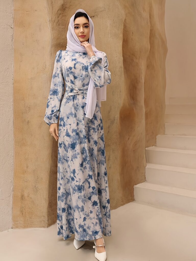 Model wearing a flowing Sahara Nights floral maxi dress, perfect for parties and cultural events.