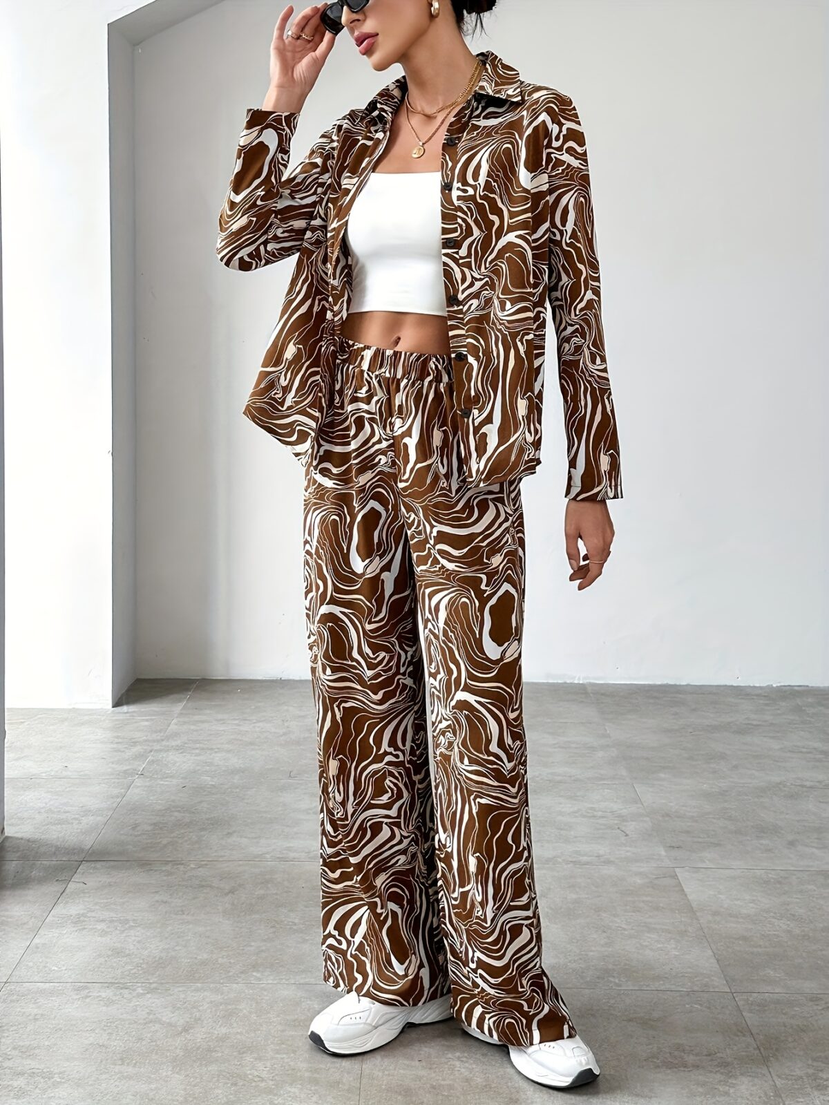 The Newness Cairo Geometric Print Suit A chic and modern suit perfect for spring featuring a striking geometric print