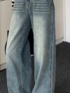 Effortless Chic Wide Leg Jeans by Newness in premium denim showcasing a modern and chic wide leg silhouette