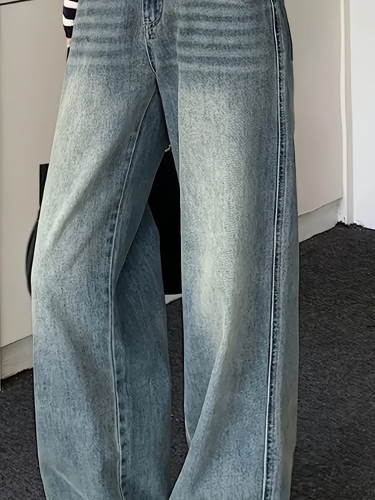 Effortless Chic Wide Leg Jeans by Newness in premium denim showcasing a modern and chic wide leg silhouette