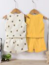 Adorable baby boy in a trendy Newness cactus print outfit featuring a waffle knit vest and pants Perfect summer clothes