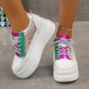 Newness Elevated Edge Chunky Platform Sneakers in white showcasing the chunky platform sole modern design and breathable fabric The shoes are styled on a models feet emphasizing their comfortable and confident lift