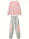 Adorable girls playful dolphin print suit in a comfortable loose fit perfect for spring and fall