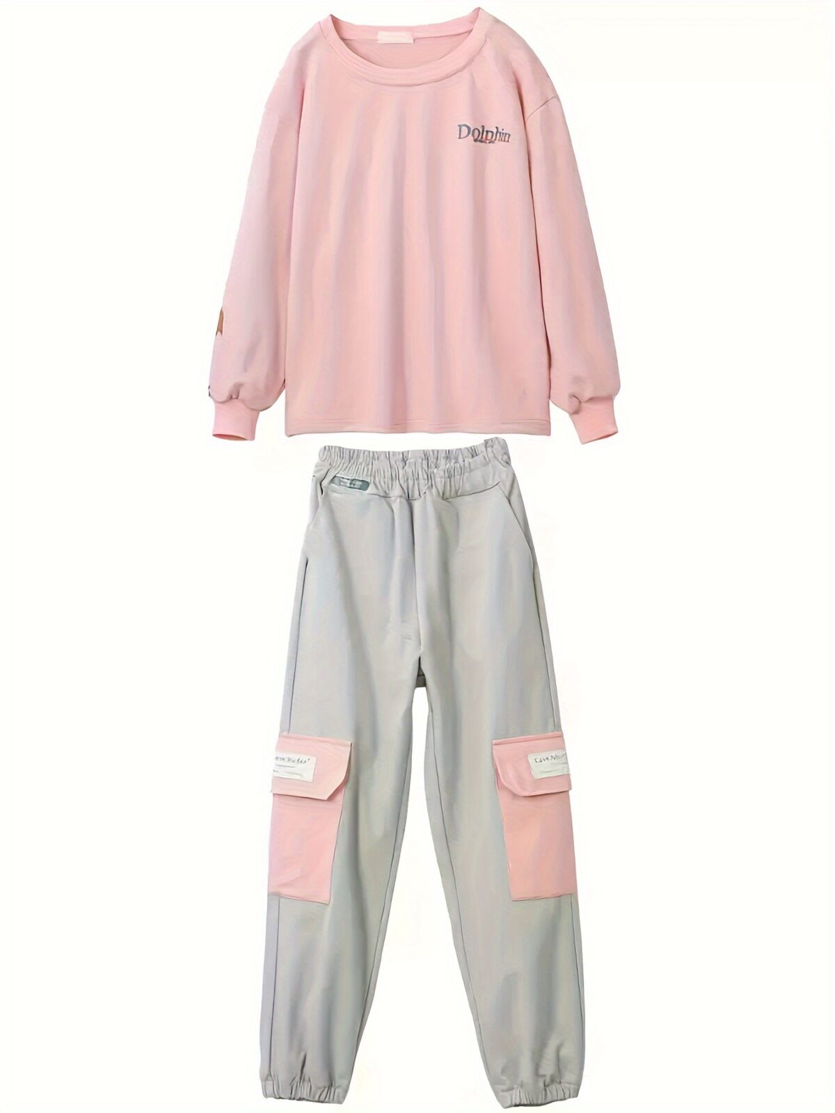 Adorable girls playful dolphin print suit in a comfortable loose fit perfect for spring and fall