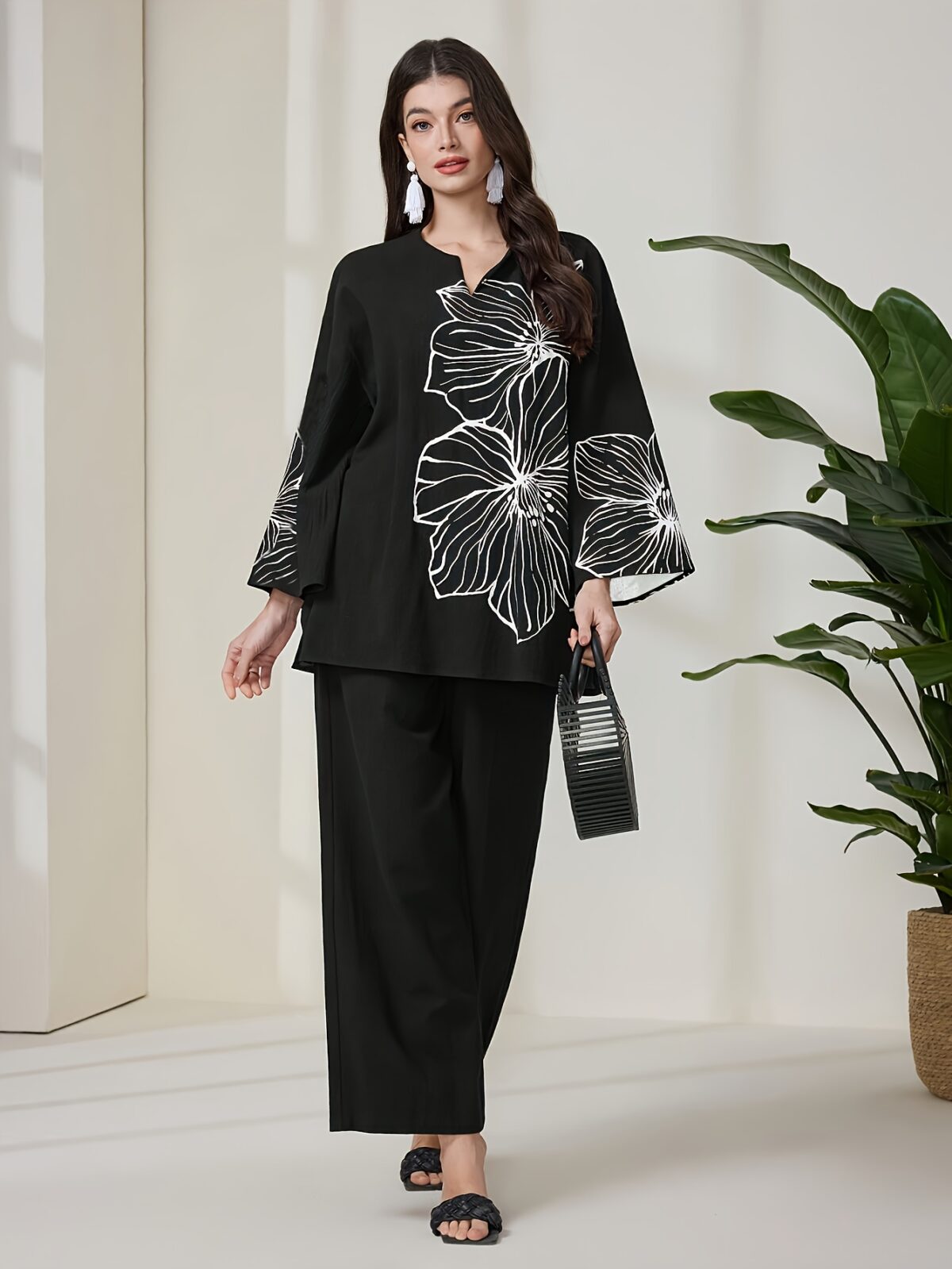 Embrace the autumn season in style with Newnesss Autumn Bloom Floral Print Set This chic two piece ensemble features a soft polyester fabric and a beautiful floral print perfect for effortless autumn fashion