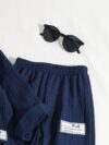 Stylish boys two piece outfit in a trendy striped pattern featuring a comfortable stand collar shirt and cuffed pants perfect for spring or autumn