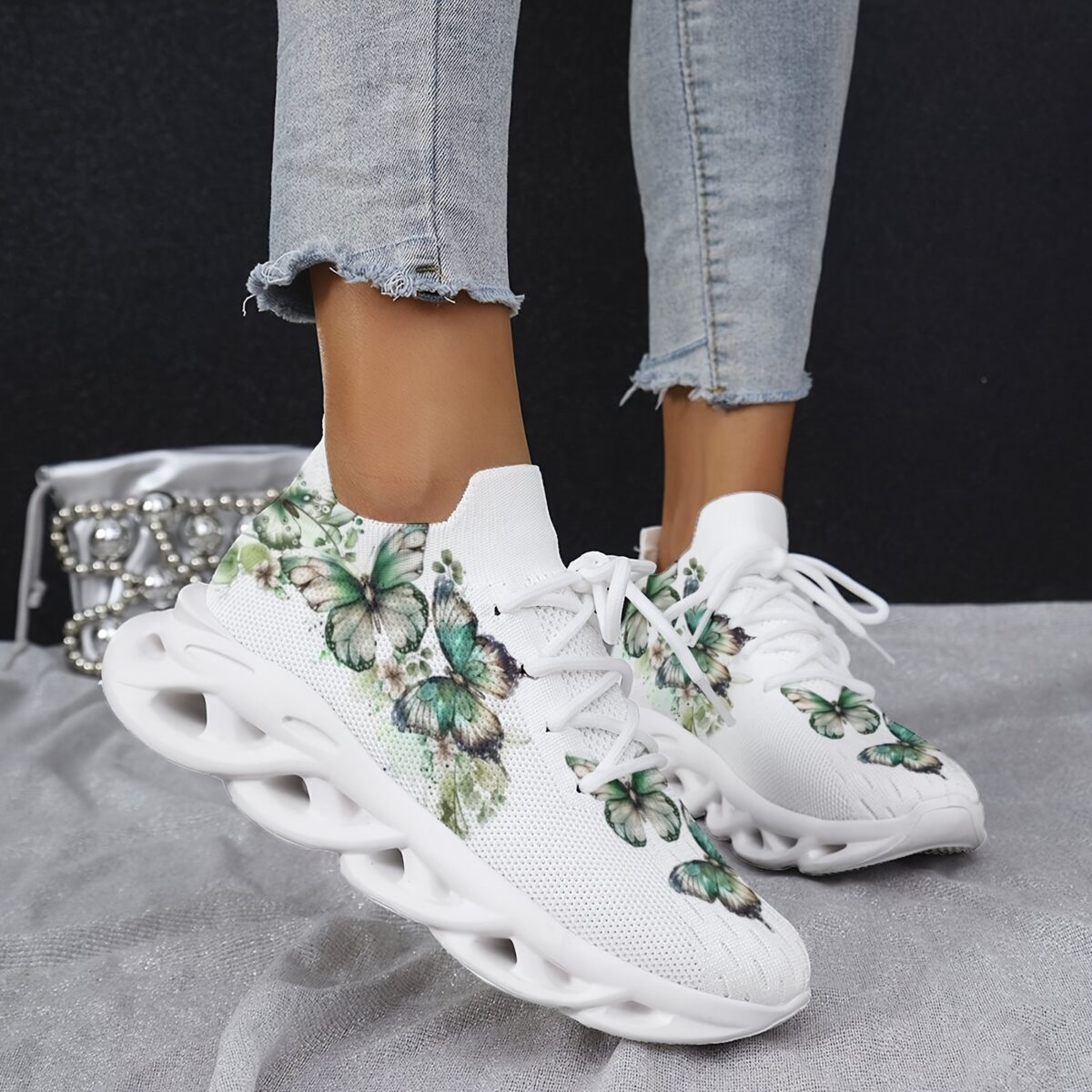 Newness Whimsical Butterfly Print Sneakers Chic and comfortable sneakers featuring a playful butterfly print perfect for any occasion