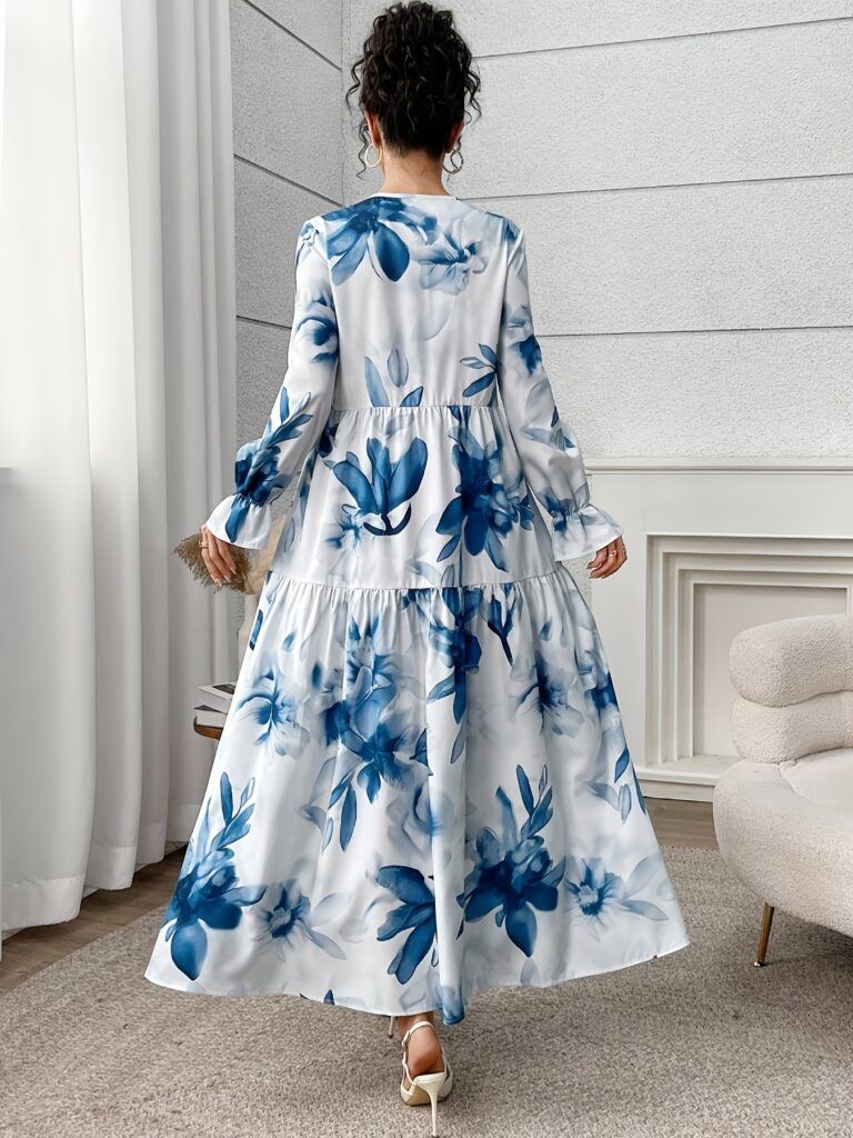 Casablanca Floral Print Maxi Dress from Newness. A stunning maxi dress with a vibrant floral print, perfect for any occasion.