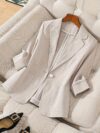 Womens elegant white blazer perfect for spring and summer offering a chic and comfortable fit Versatile jacket to elevate your style