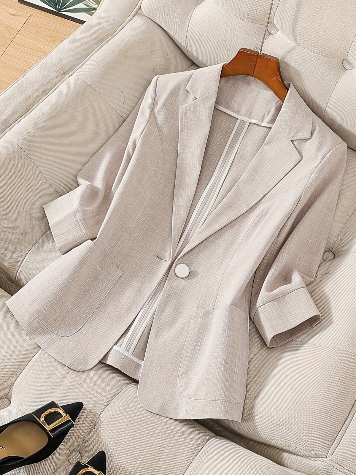 Womens elegant white blazer perfect for spring and summer offering a chic and comfortable fit Versatile jacket to elevate your style