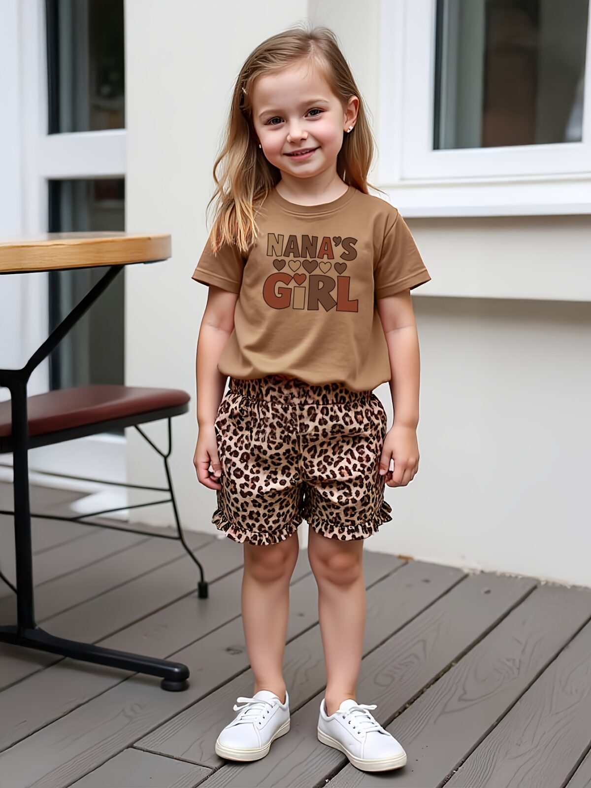 Adorable little girls summer outfit featuring a chic leopard print and a playful Daddys Girl graphic