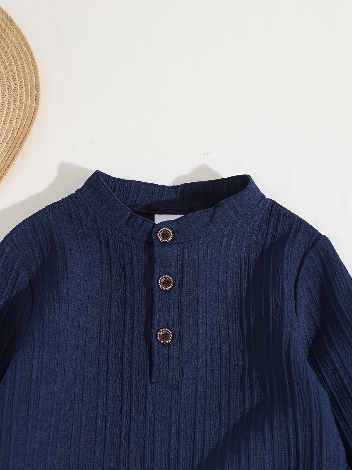 Stylish boys two piece outfit in a trendy striped pattern featuring a comfortable stand collar shirt and cuffed pants perfect for spring or autumn