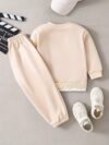 Stylish boys cozy cargo outfit set perfect for fall adventures Features a comfortable sweatshirt and matching cargo sweatpants in trendy colors Ideal for boys aged 12 and under