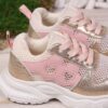 Adorable girls mesh sneakers in pink and white with glittery accents perfect for spring summer or fall Breathable and comfortable for active play