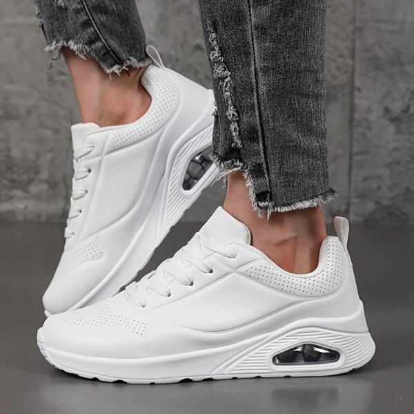 Newness The Dubai Breeze White Leather Sneakers: Breathable, comfortable white leather sneakers with perforations and air cushion technology.