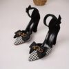Newness Chic Houndstooth Block Heels with Bowknot Detail Stylish pointed toe sandals in a classic houndstooth pattern featuring a comfortable block heel and elegant bowknot accent