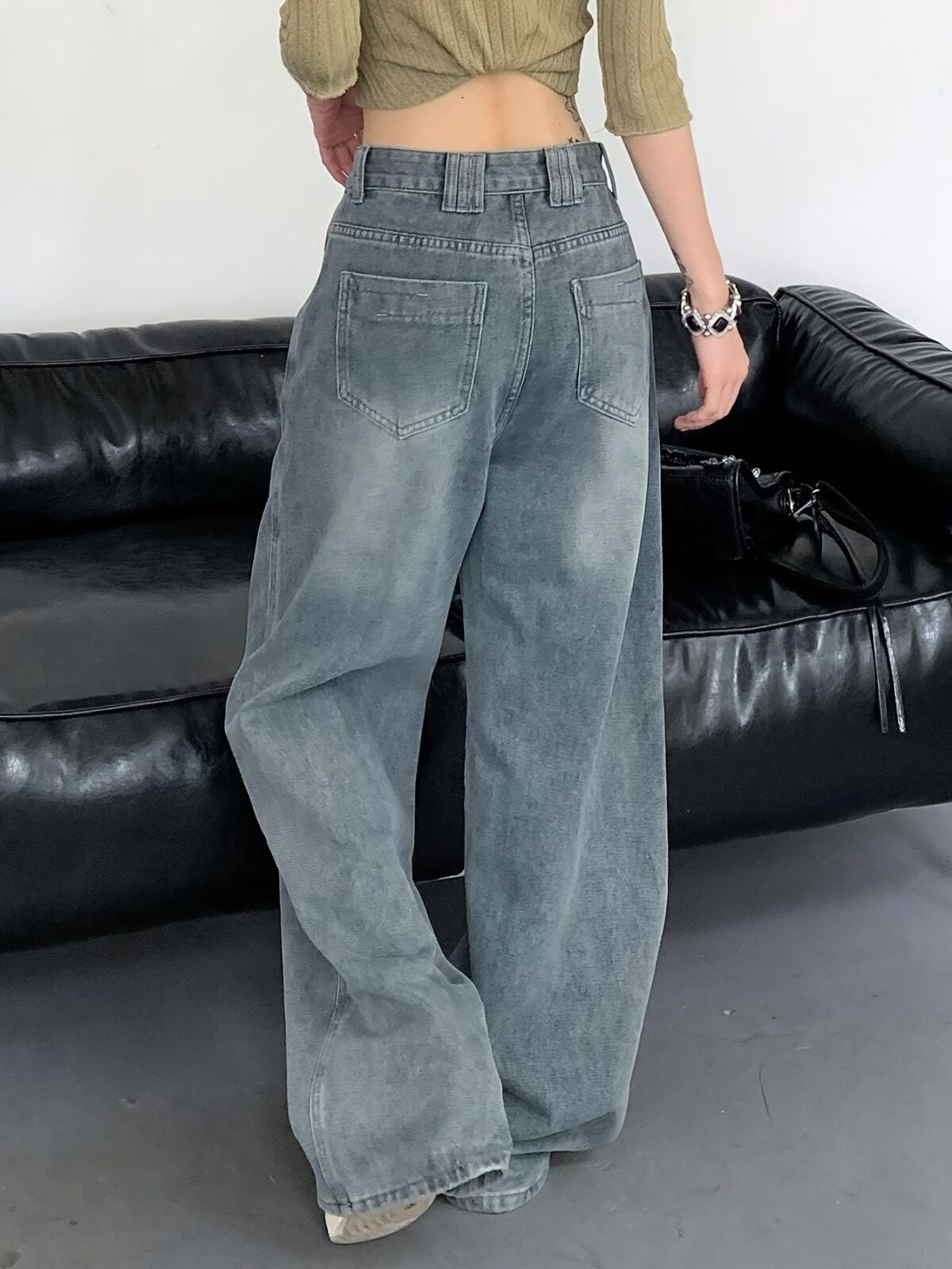 Newness Parisian High Waisted Wide Leg Jeans Flattering comfortable wide leg jeans in a chic style Model wearing light wash denim