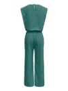 Model wearing the Newness Effortless Chic Sleeveless Wide Leg Set a stylish and comfortable two piece outfit featuring a sleeveless top and wide leg pants in luxurious polyester