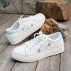 Newness Blush Butterfly Lace Up Sneakers Chic blush colored sneakers with butterfly accents and lace up closure perfect for spring