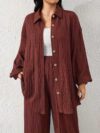 Effortless Chic Newness Belted Shirt and Pants Set in textured fabric Model showcasing the all season comfort and stylish silhouette