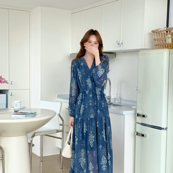 Effortless elegance in our Azure Bloom Floral Print Maxi Dress. Perfect for any occasion.