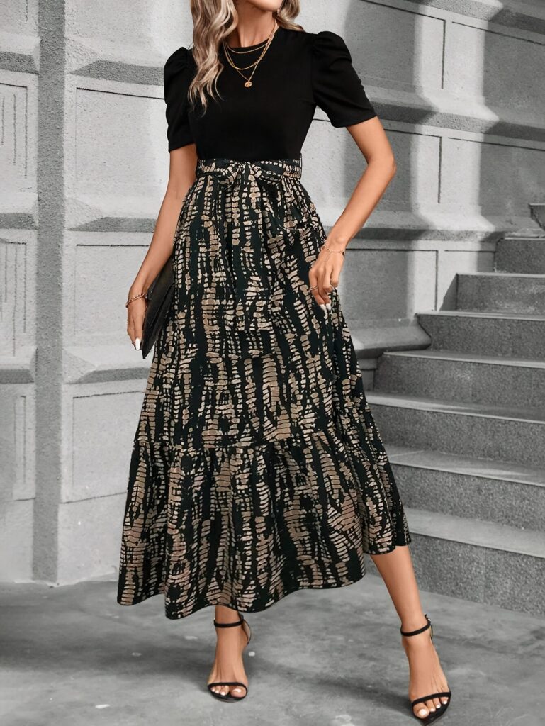 Effortless style meets modern chic in this Casablanca print A-line dress, perfect for any occasion.