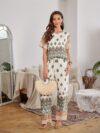 The Newness Riviera Rendezvous Geometric Print Set A stylish two piece outfit featuring a vibrant geometric print perfect for summer occasions Model showcases effortless chic