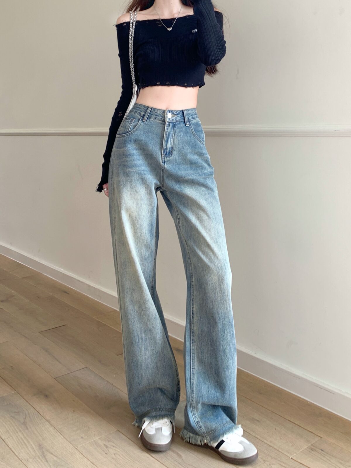 Santorini Vintage Wide Leg Jeans in a flattering wide leg style made from premium denim Shown in a stylish setting