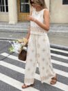 Effortlessly chic Casablanca Floral Print Set from Newness a luxurious two piece outfit in a vibrant floral print crafted from a rayon and polyester blend