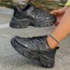 Newness Metropolitan Black Platform Sneakers Elevate your style with these chic and comfortable black platform sneakers perfect for any occasion