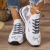 Newness Bloomsbury Floral Print Sneakers Chic and comfortable floral print sneakers perfect for any season View the stylish design