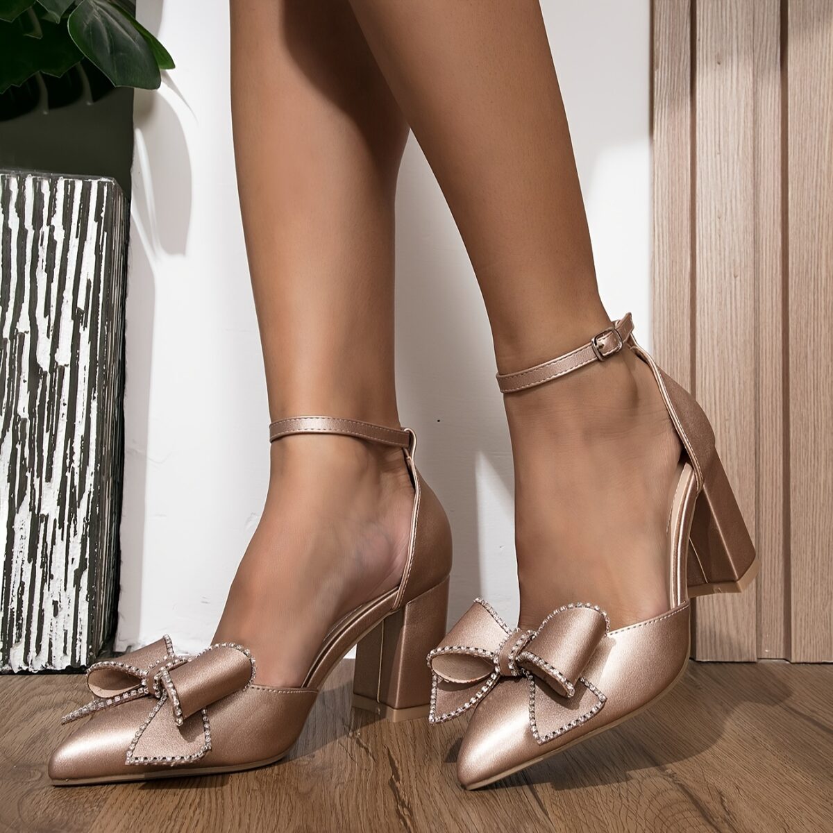 Newness Champagne Sparkle Block Heel Pumps showcasing champagne colored heels with a sparkling bow detail perfect for weddings parties and formal events