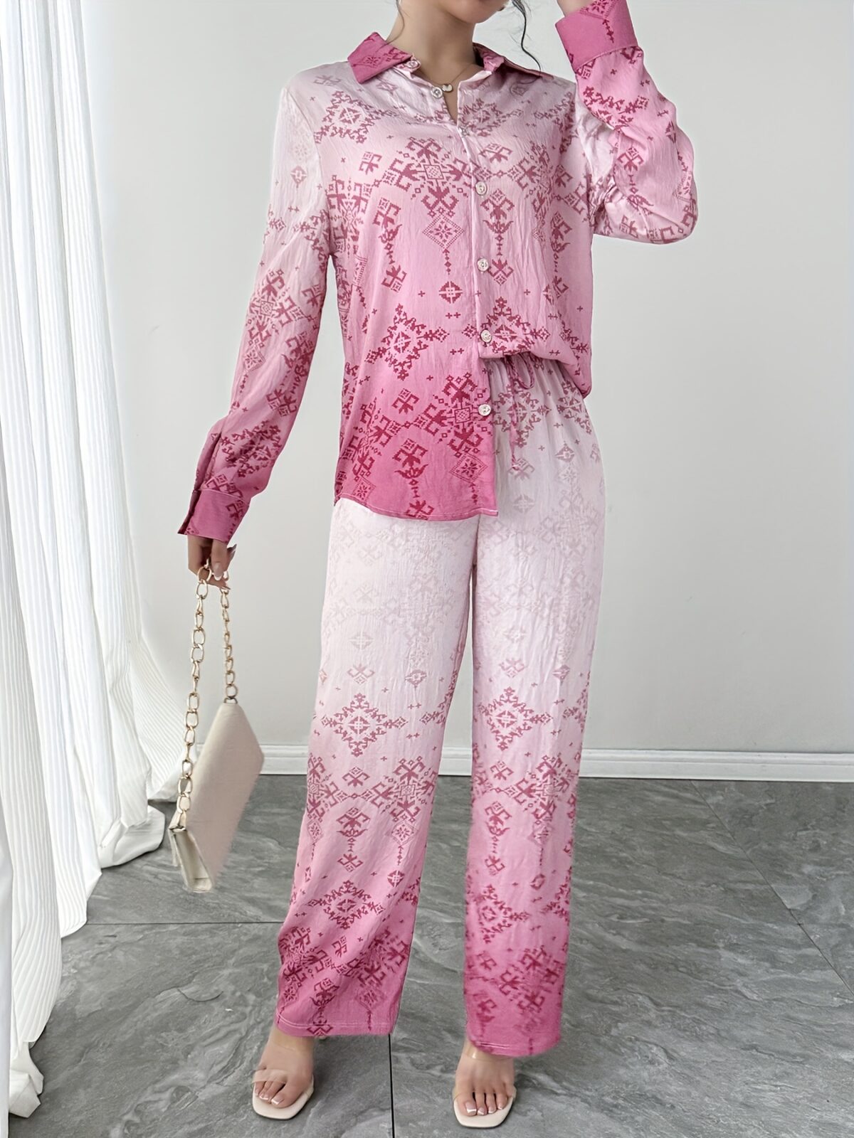 Stylish womens Dubai Nights Printed Pants Set from Newness Flattering wide leg pants and a coordinating top in a vibrant Middle Eastern inspired print Perfect for evening events or a chic daytime look
