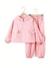 Girl wearing a stylish hooded suit perfect for spring Dubai inspired design