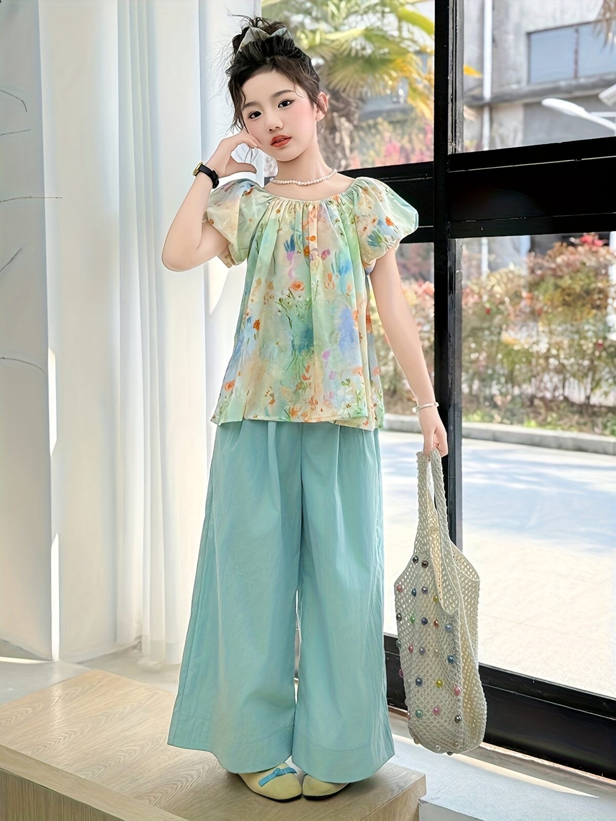 Effortlessly chic Newness Summer Breeze Floral Print Set A two piece outfit perfect for sunny days featuring a breezy floral print