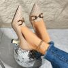 Newness Houndstooth Chain Buckle Stilettos Pointed toe heels in a chic houndstooth pattern with a sophisticated gold chain buckle Perfect for adding a touch of elegance to your party or nightclub outfit