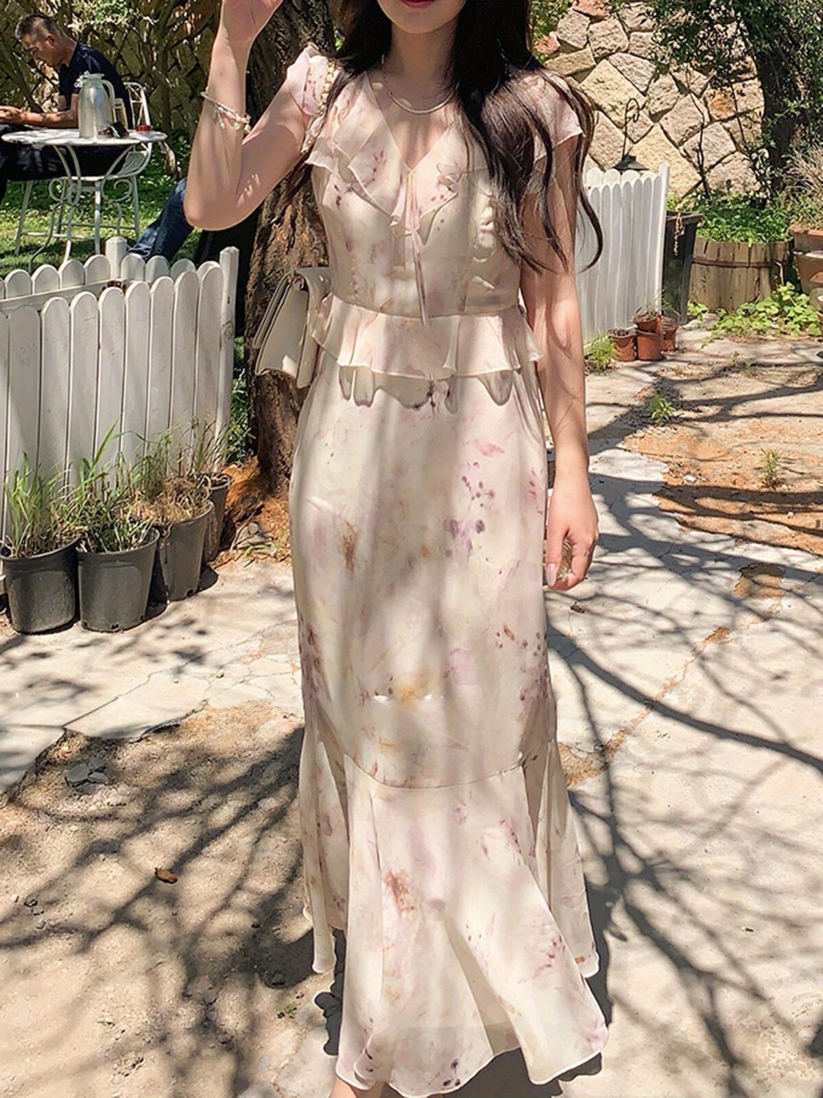 Effortlessly chic Newness Casablanca Floral Print Dress in a flattering silhouette with ruffle detailing perfect for summer