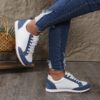Stylish and comfortable Newness Cityscape Casual Fabric Sneakers perfect for everyday wear in any season The image shows the sneakers from an angle showcasing the fabric texture and design details