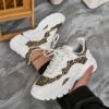 Newness City Chic Leopard Print Sneakers Stylish and comfortable leopard print sneakers perfect for any occasion