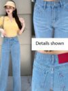Glacier blue embroidered wide leg jeans from Newness showcasing intricate embroidery and a flattering wide leg silhouette