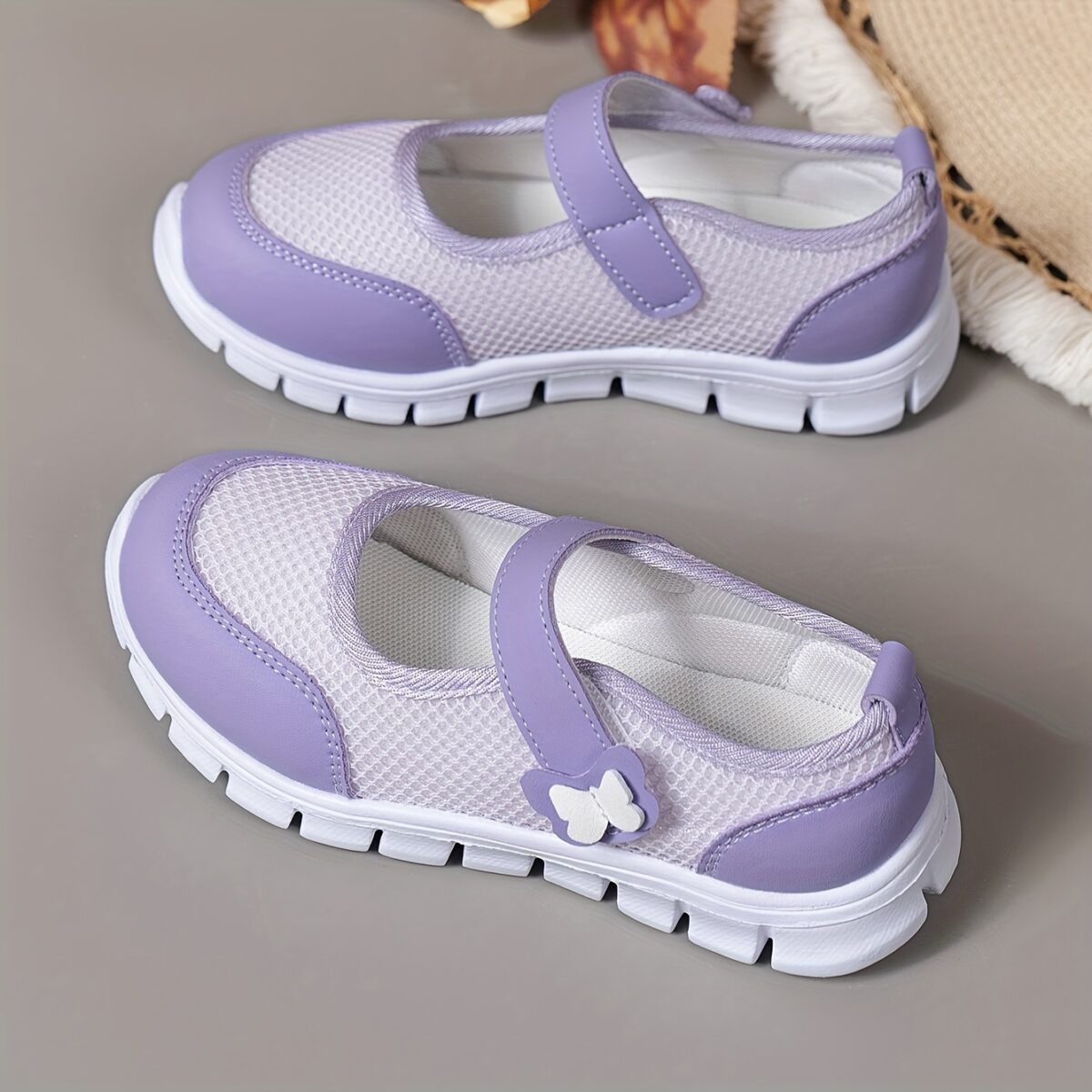 Pastel purple and white Twinkle Toes Girls Magical Closure Sneakers showcasing their comfortable design and easy onoff feature Ideal for school play or dance