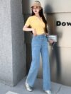 Glacier blue embroidered wide leg jeans from Newness showcasing intricate embroidery and a flattering wide leg silhouette