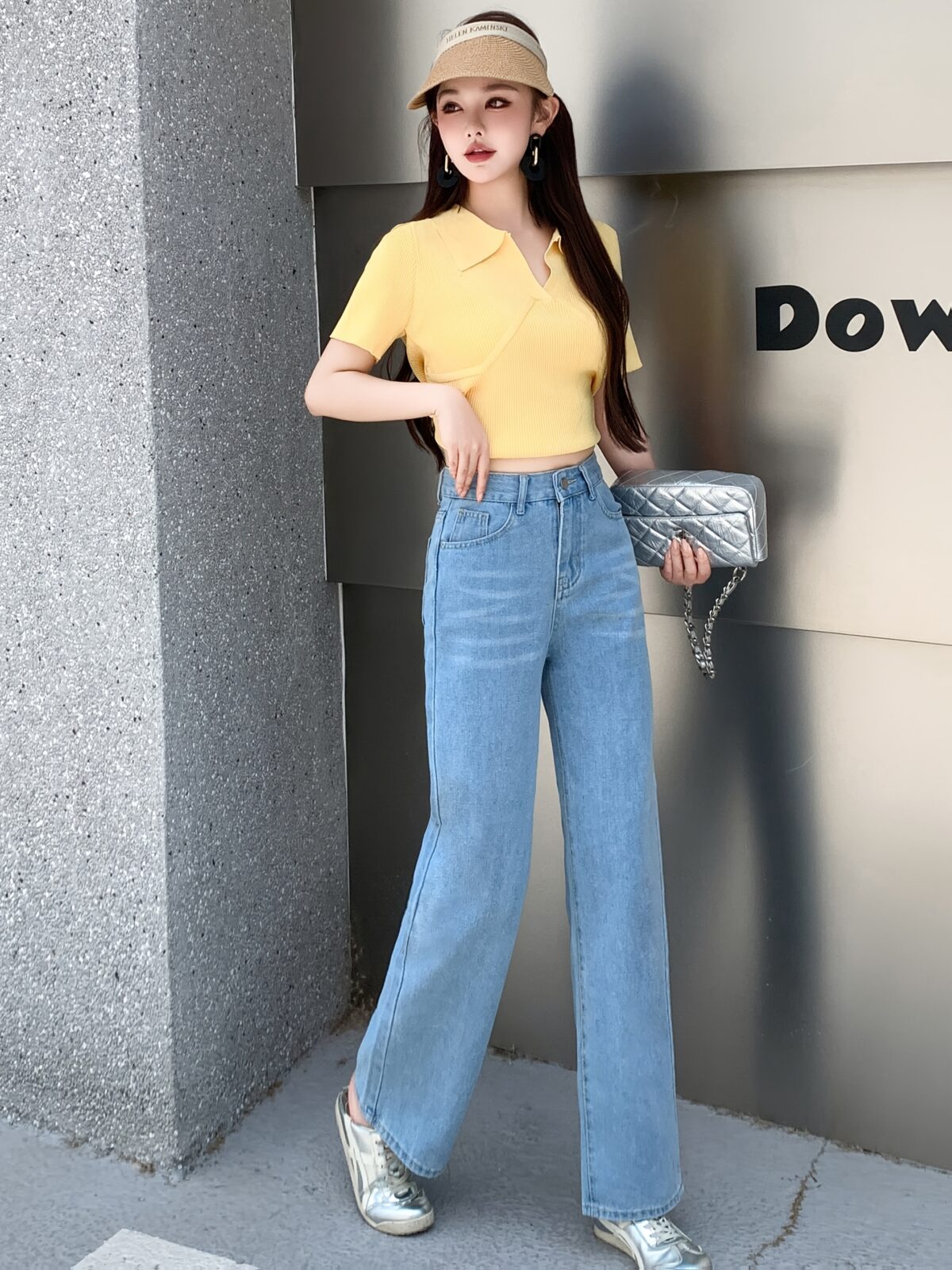 Glacier blue embroidered wide leg jeans from Newness showcasing intricate embroidery and a flattering wide leg silhouette
