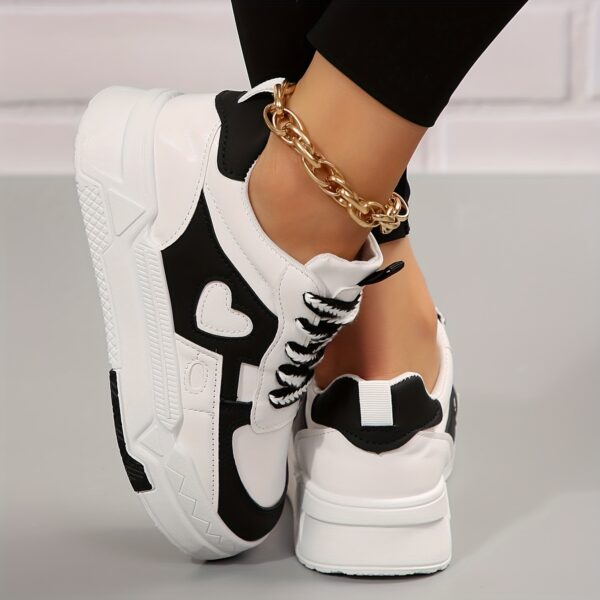 Newness Monochrome Magic Heart Pattern Sneakers Stylish monochrome heart pattern sneakers offering sporty comfort