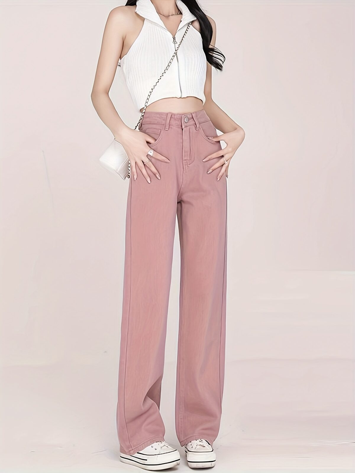 Newness Milan High Waisted Straight Leg Jeans Flattering fit timeless style A model wears the jeans