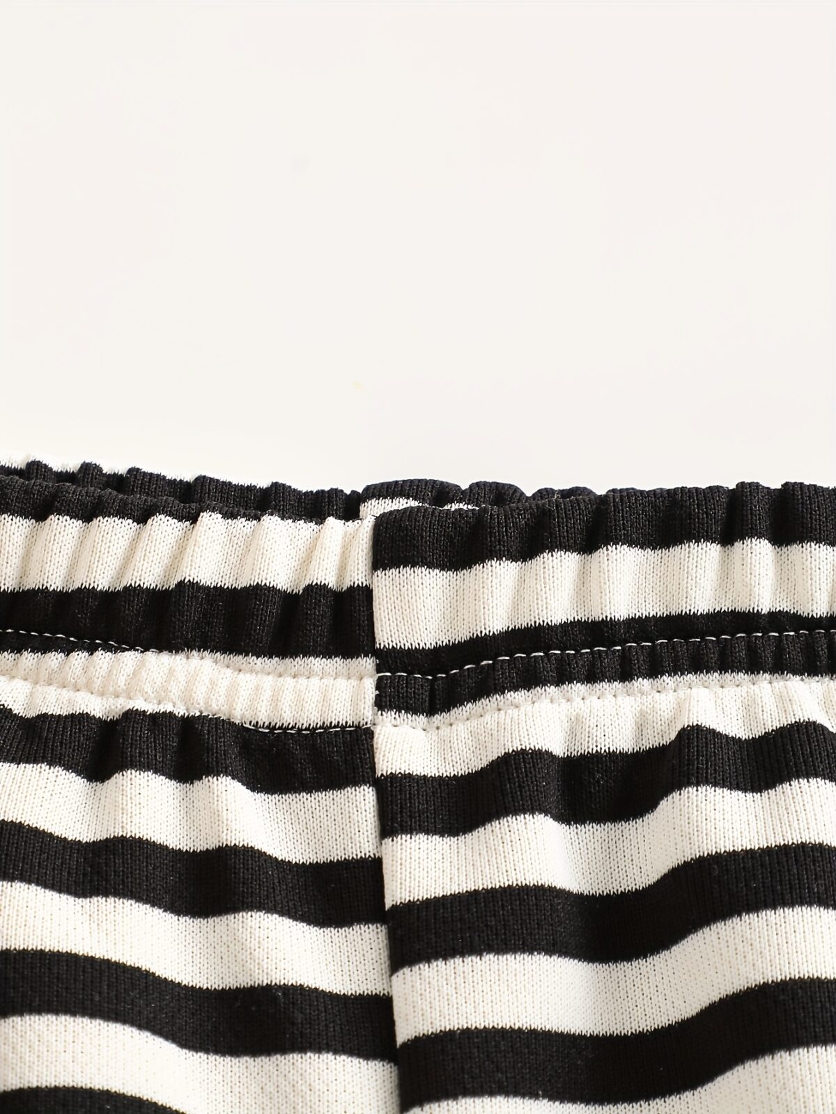 Adorable boys striped two piece outfit perfect for spring and autumn Stylish and comfortable for outdoor play Shop Newness for kids clothing