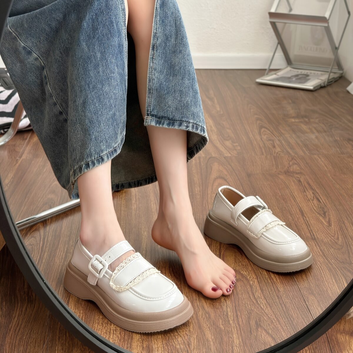 Cream and black Parisian Chic Platform Mary Janes by Newness A retro inspired shoe with a modern platform sole showcasing comfort and style