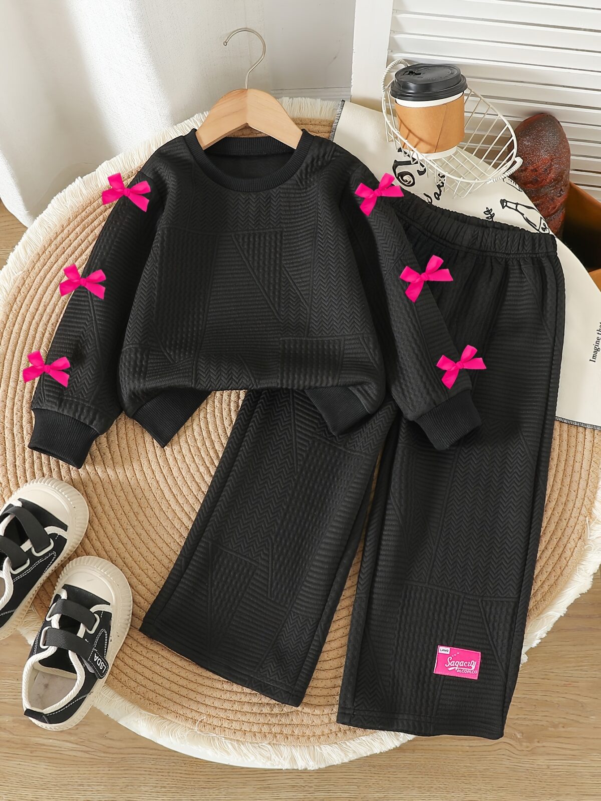 Adorable girls two piece autumn outfit cozy knit top and loose fitting pants perfect for fall adventures Dubai design