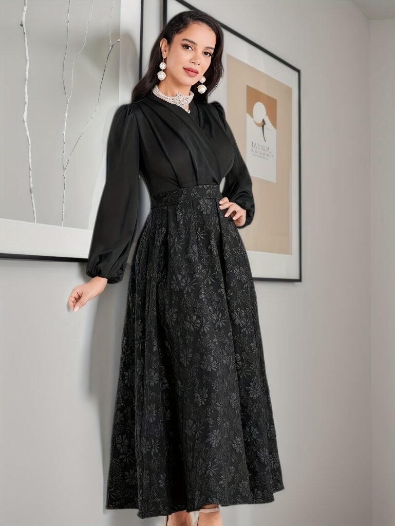 Model wearing the Newness Midnight Bloom Asymmetrical Wrap Dress, a flattering, dark-colored wrap dress perfect for summer evenings. The dress features an asymmetrical hemline and a chic, effortless silhouette.