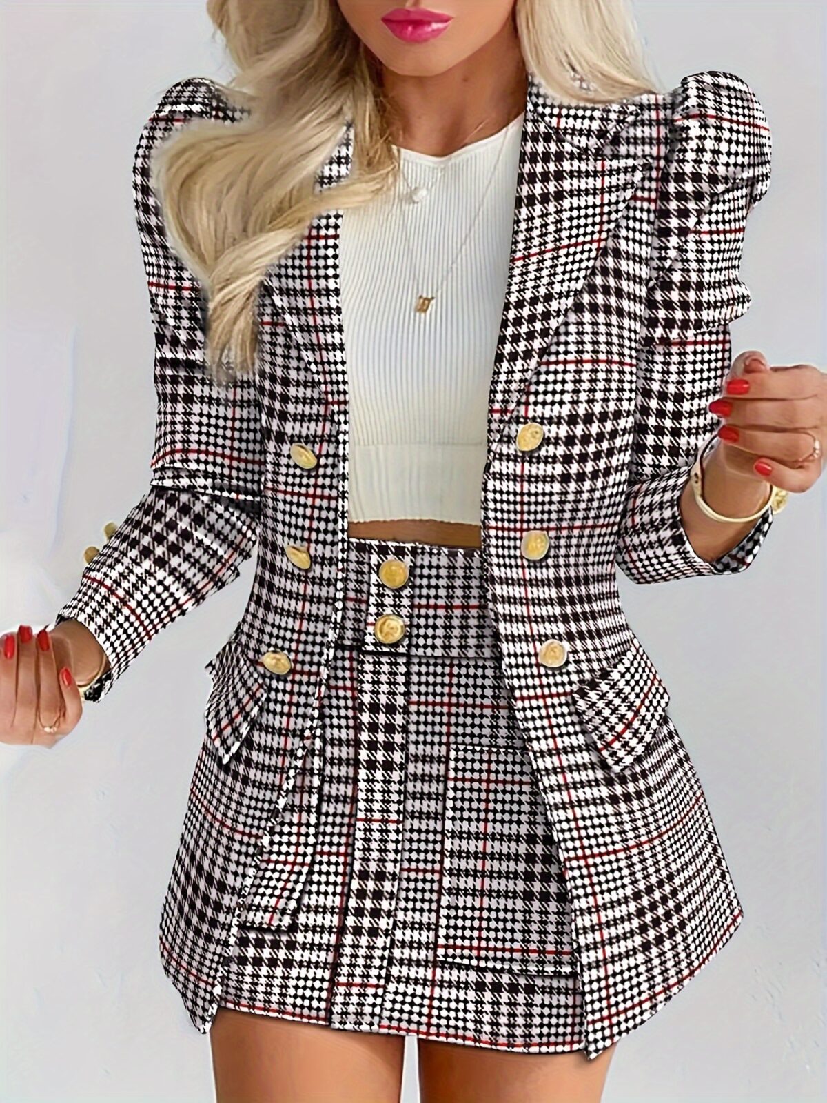 Model showcasing the Newness Kensington Plaid Skirt Set a chic and modern take on the classic plaid skirt set Featuring a stylishly tailored skirt and coordinating top